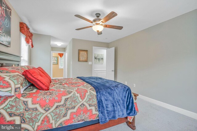 4904 Charmed Ct, Woodbridge, VA 22192 - carpeted bedroom with baseboards and a ceiling fan