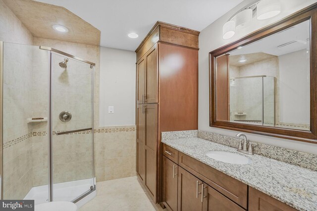 4904 Charmed Ct, Woodbridge, VA 22192 - full bathroom with vanity, a stall shower, and recessed lighting