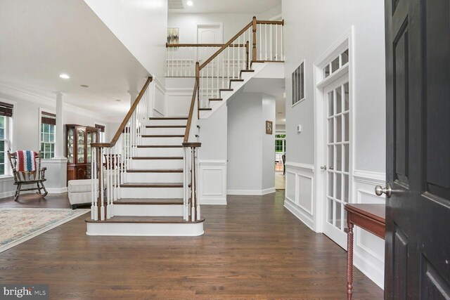 4904 Charmed Ct, Woodbridge, VA 22192 - foyer entrance featuring stairs, wood finished floors, recessed lighting, ornamental molding, and a towering ceiling