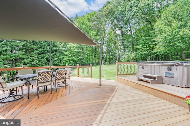 4904 Charmed Ct, Woodbridge, VA 22192 - wooden deck featuring outdoor dining area, view of scattered trees, a lawn, and a hot tub