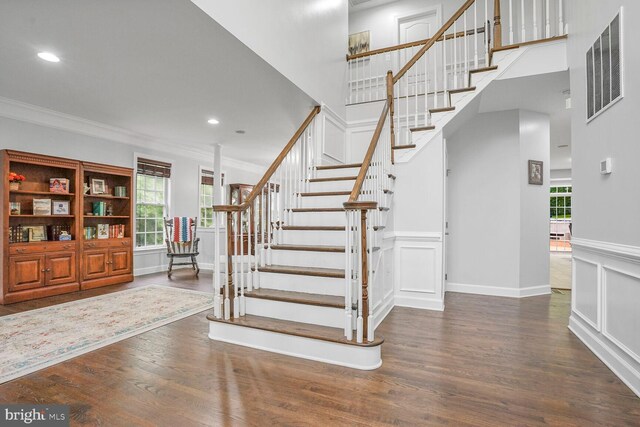 4904 Charmed Ct, Woodbridge, VA 22192 - foyer entrance featuring crown molding, wood finished floors, stairs, baseboards, and recessed lighting