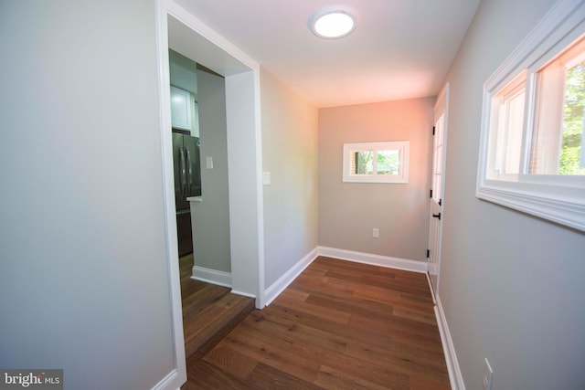 1407 Ruatan St, Hyattsville, MD 20783 - corridor with dark wood-type flooring and baseboards