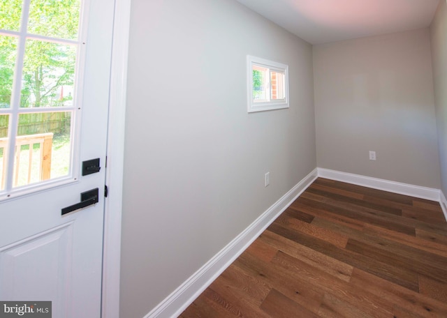 1407 Ruatan St, Hyattsville, MD 20783 - doorway to outside with dark wood-type flooring and baseboards