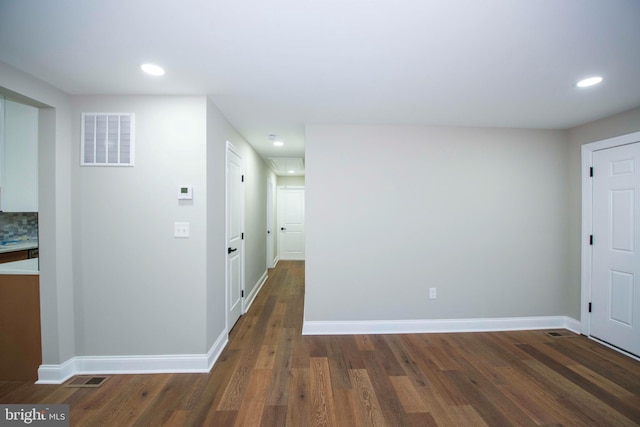1407 Ruatan St, Hyattsville, MD 20783 - hall with wood finished floors, recessed lighting, and baseboards