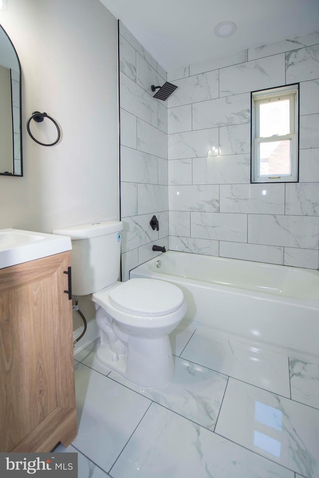 1407 Ruatan St, Hyattsville, MD 20783 - full bath with marble finish flooring, vanity, toilet, and shower / bathtub combination