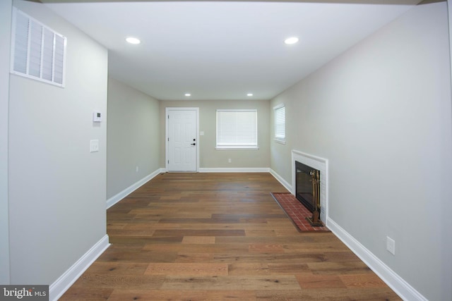 1407 Ruatan St, Hyattsville, MD 20783 - hall featuring recessed lighting, wood finished floors, and baseboards