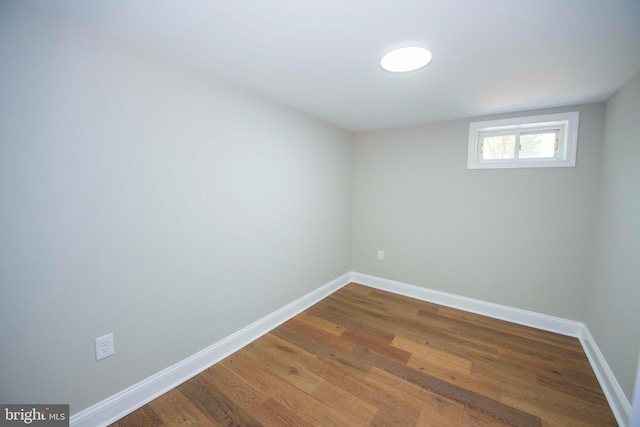 1407 Ruatan St, Hyattsville, MD 20783 - spare room featuring baseboards and wood finished floors