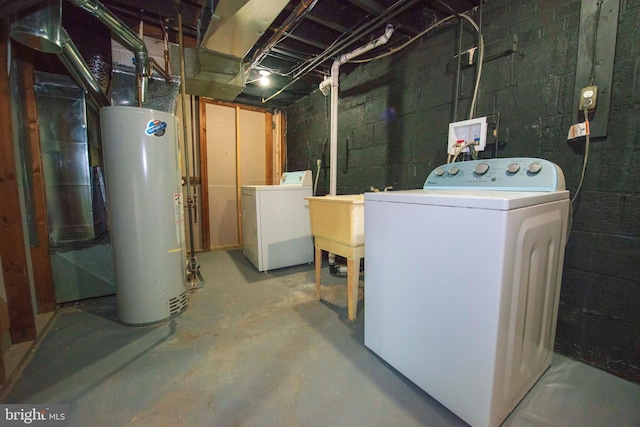 1407 Ruatan St, Hyattsville, MD 20783 - unfinished basement with gas water heater, concrete block wall, independent washer and dryer, and a sink
