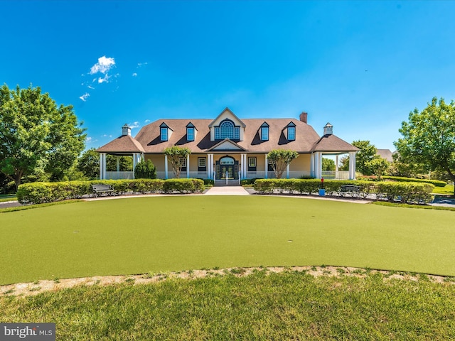 2409 Bear Den Rd, Frederick, MD 21701 - cape cod house with a putting green and a chimney