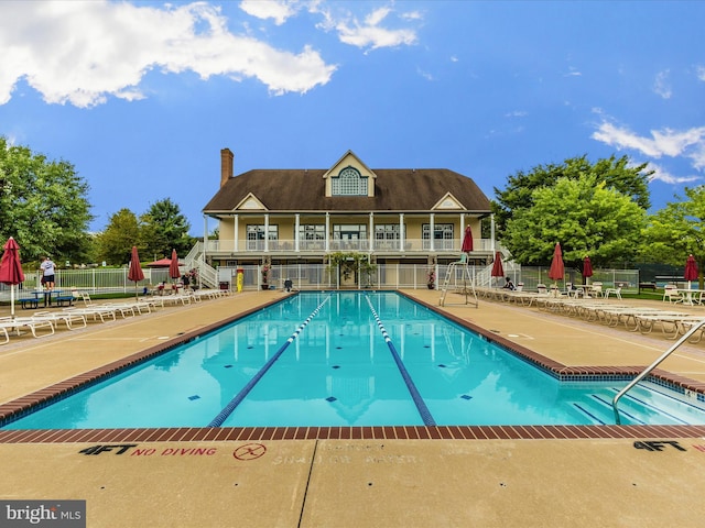 2409 Bear Den Rd, Frederick, MD 21701 - community pool with a patio area