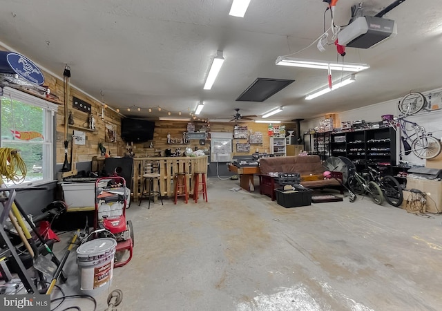 24950 Morgan Rd, Hollywood, MD 20636 - garage with a workshop area and a garage door opener
