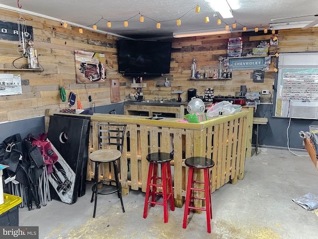 24950 Morgan Rd, Hollywood, MD 20636 - bar with wood walls, concrete floors, and a sink