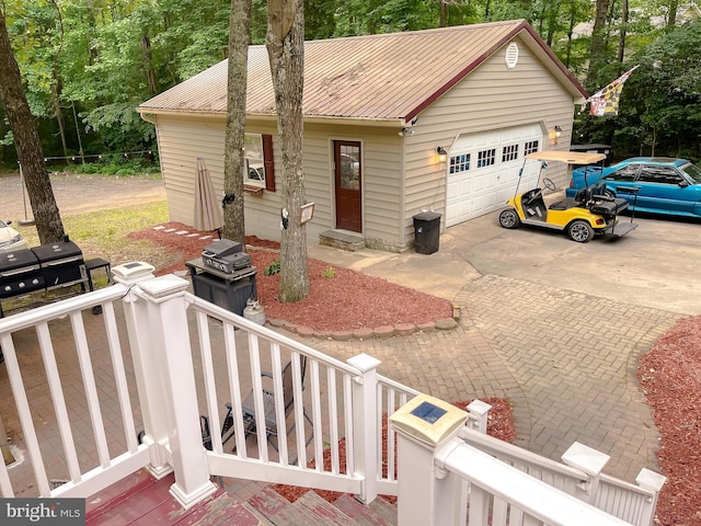 24950 Morgan Rd, Hollywood, MD 20636 - ranch-style home featuring metal roof and a detached garage