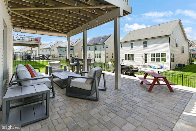 8516 Silver Laurel Ln, Frederick, MD 21704 - view of patio / terrace with a residential view, outdoor dining area, an outdoor living space, and central AC