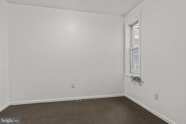 1504 N 57th St, Philadelphia, PA 19131 - empty room with dark carpet and baseboards