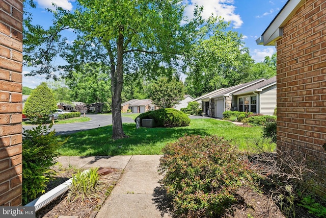 2516 N Haven Cv, Annapolis, MD 21401 - view of green lawn with an attached garage