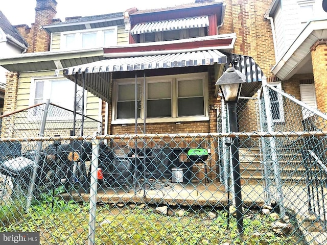 6553 N Smedley St, Philadelphia, PA 19126 - back of property featuring brick siding
