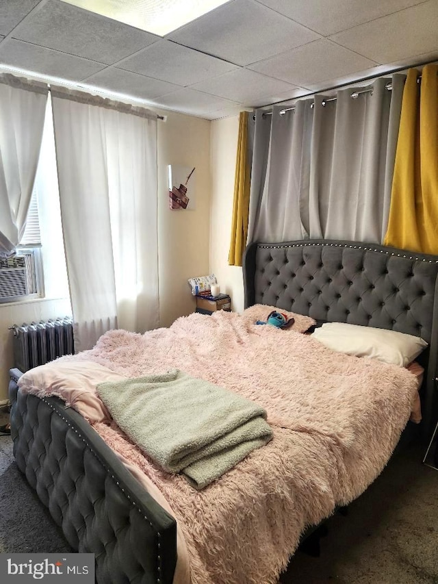 6553 N Smedley St, Philadelphia, PA 19126 - bedroom with radiator heating unit, carpet, a drop ceiling, and cooling unit