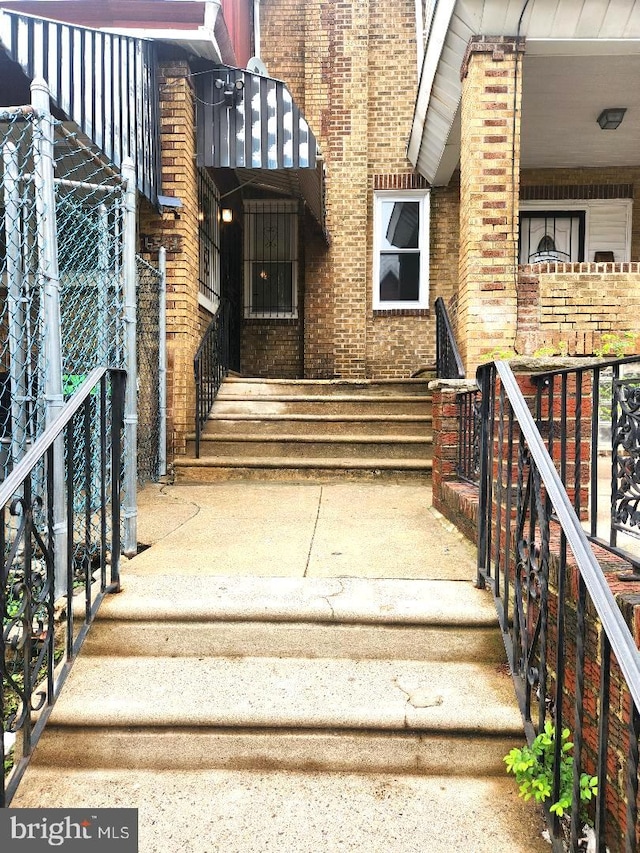 6553 N Smedley St, Philadelphia, PA 19126 - property entrance featuring brick siding