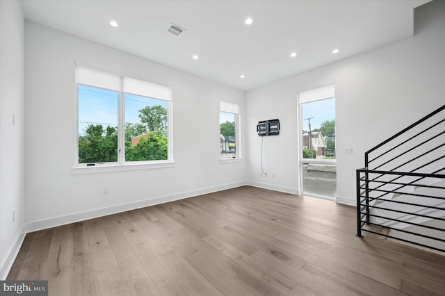 6522 Magnolia St, Philadelphia, PA 19119 - foyer entrance with healthy amount of natural light, wood finished floors, stairway, and recessed lighting