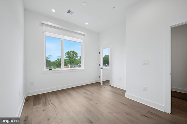 6522 Magnolia St, Philadelphia, PA 19119 - empty room with wood finished floors, baseboards, and recessed lighting