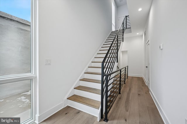 6522 Magnolia St, Philadelphia, PA 19119 - staircase featuring wood finished floors, recessed lighting, and baseboards