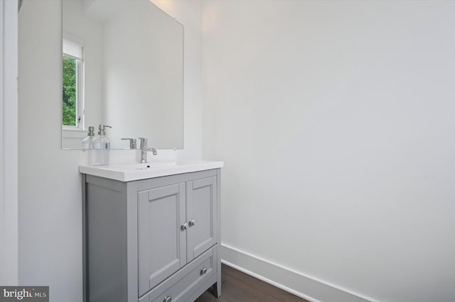 6522 Magnolia St, Philadelphia, PA 19119 - bathroom featuring vanity, wood finished floors, and baseboards