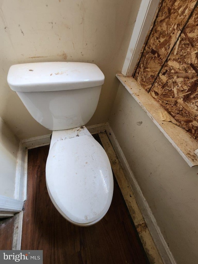 3057 Brighton St, Baltimore, MD 21216 - bathroom with baseboards and toilet