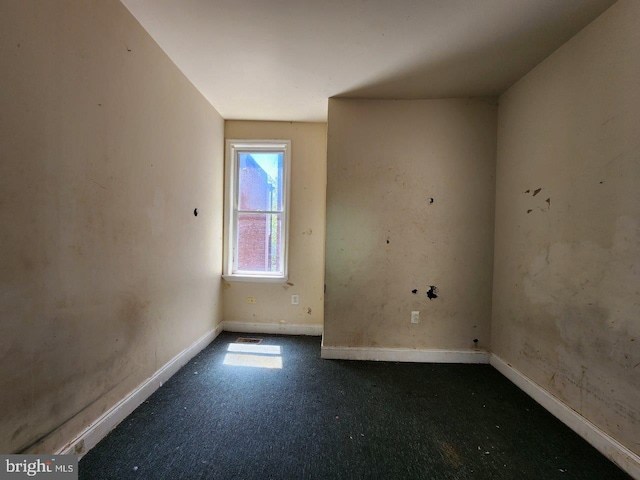 3057 Brighton St, Baltimore, MD 21216 - spare room featuring carpet and baseboards