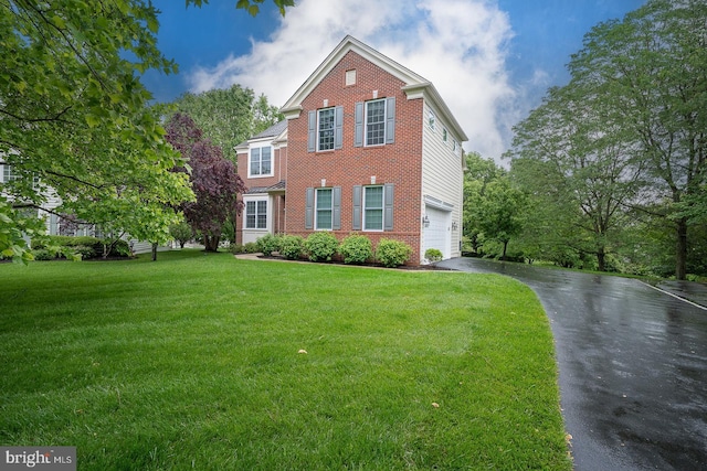 11 Ridings Way, West Chester, PA 19382 - view of front facade featuring driveway, an attached garage, a front lawn, and brick siding