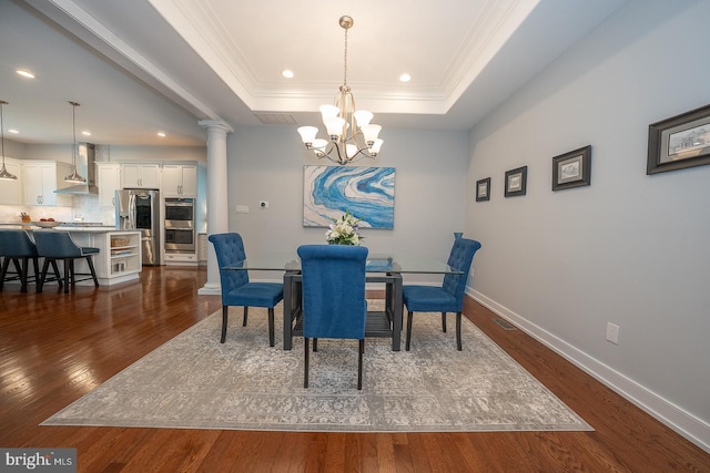 11 Ridings Way, West Chester, PA 19382 - dining area with dark wood finished floors, a chandelier, baseboards, recessed lighting, and a raised ceiling