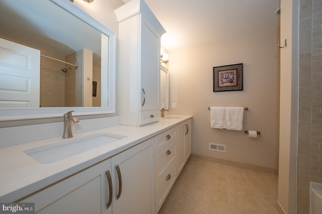 11 Ridings Way, West Chester, PA 19382 - full bathroom with double vanity, tile patterned flooring, and baseboards