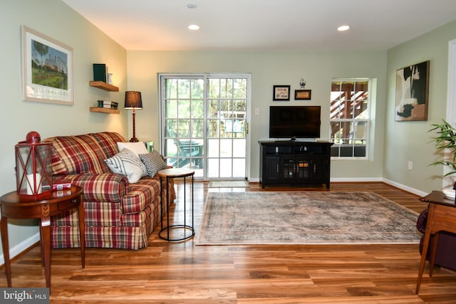 9111 Dartford Pl, Bristow, VA 20136 - living area featuring wood finished floors and recessed lighting