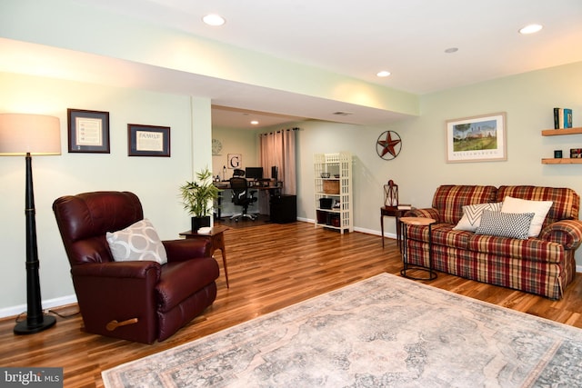 9111 Dartford Pl, Bristow, VA 20136 - living room featuring wood finished floors, recessed lighting, and a desk