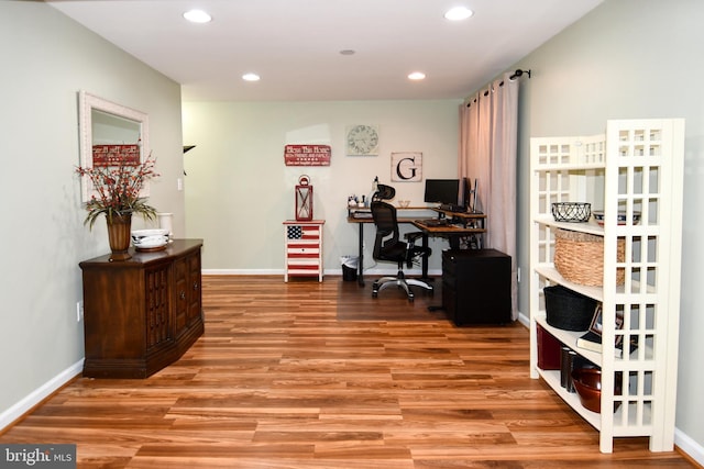 9111 Dartford Pl, Bristow, VA 20136 - home office with light wood-style flooring and recessed lighting
