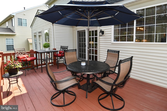 9111 Dartford Pl, Bristow, VA 20136 - wooden terrace with outdoor dining space