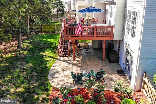 9111 Dartford Pl, Bristow, VA 20136 - fenced backyard featuring a patio, a deck, and stairs