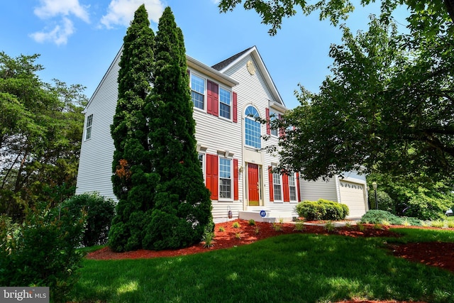 9111 Dartford Pl, Bristow, VA 20136 - colonial home featuring a front lawn