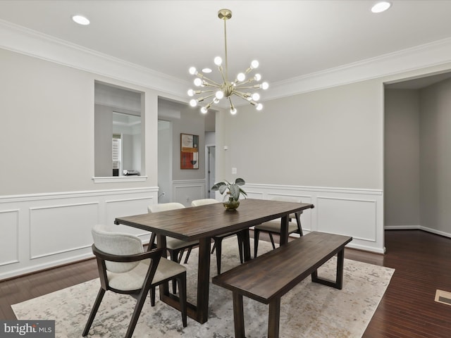 42350 Stonemont Cir, Ashburn, VA 20148 - dining room with crown molding, a chandelier, wainscoting, recessed lighting, and dark wood-type flooring