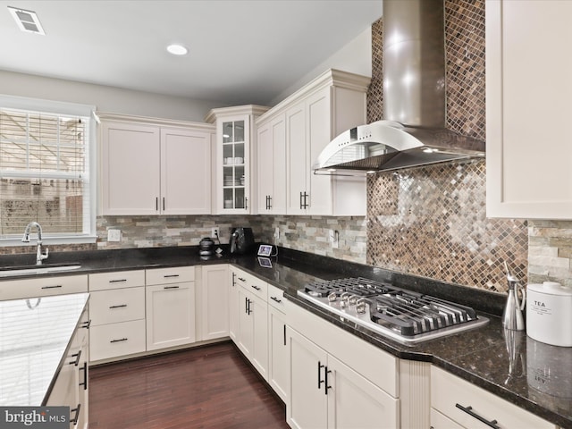 42350 Stonemont Cir, Ashburn, VA 20148 - kitchen featuring wall chimney exhaust hood, stainless steel gas stovetop, a sink, white cabinetry, and recessed lighting