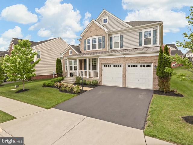 42350 Stonemont Cir, Ashburn, VA 20148 - view of front of home featuring a standing seam roof, asphalt driveway, an attached garage, a porch, and a front yard