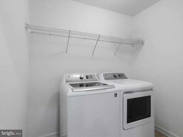 42350 Stonemont Cir, Ashburn, VA 20148 - laundry room featuring washing machine and dryer