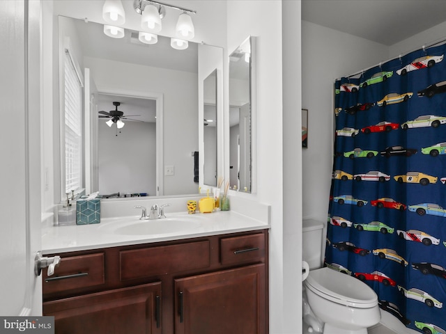 42350 Stonemont Cir, Ashburn, VA 20148 - bathroom featuring toilet, a ceiling fan, vanity, and curtained shower