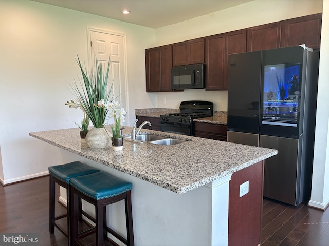 12139 Fallen Timbers Cir, Hagerstown, MD 21740 - kitchen featuring black appliances, a sink, dark wood-type flooring, baseboards, and recessed lighting