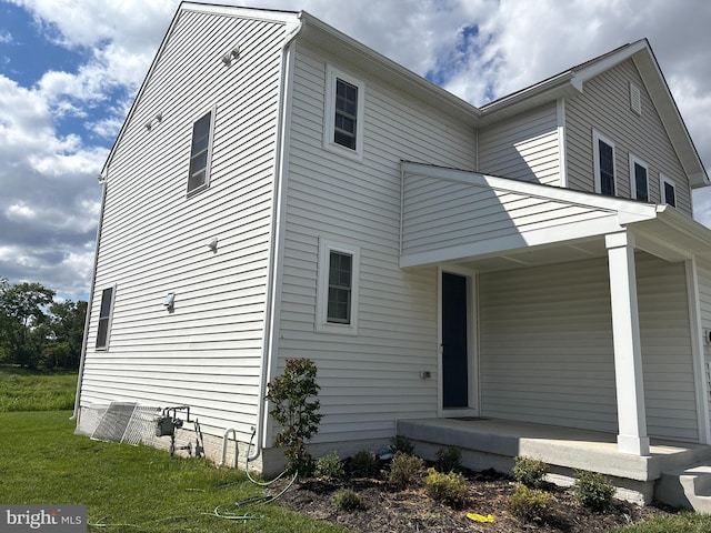 12139 Fallen Timbers Cir, Hagerstown, MD 21740 - view of home's exterior with covered porch and a lawn