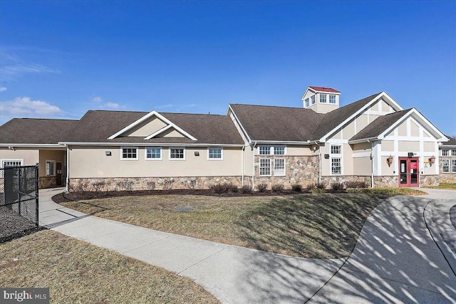 12139 Fallen Timbers Cir, Hagerstown, MD 21740 - view of front facade with stone siding, french doors, and stucco siding