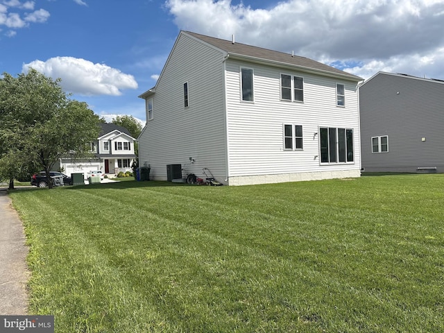 12139 Fallen Timbers Cir, Hagerstown, MD 21740 - back of house with a lawn and central AC