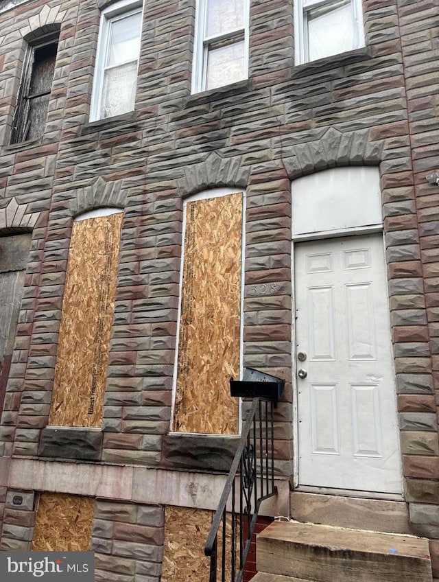 328 S Payson St, Baltimore, MD 21223 - property entrance with stone siding