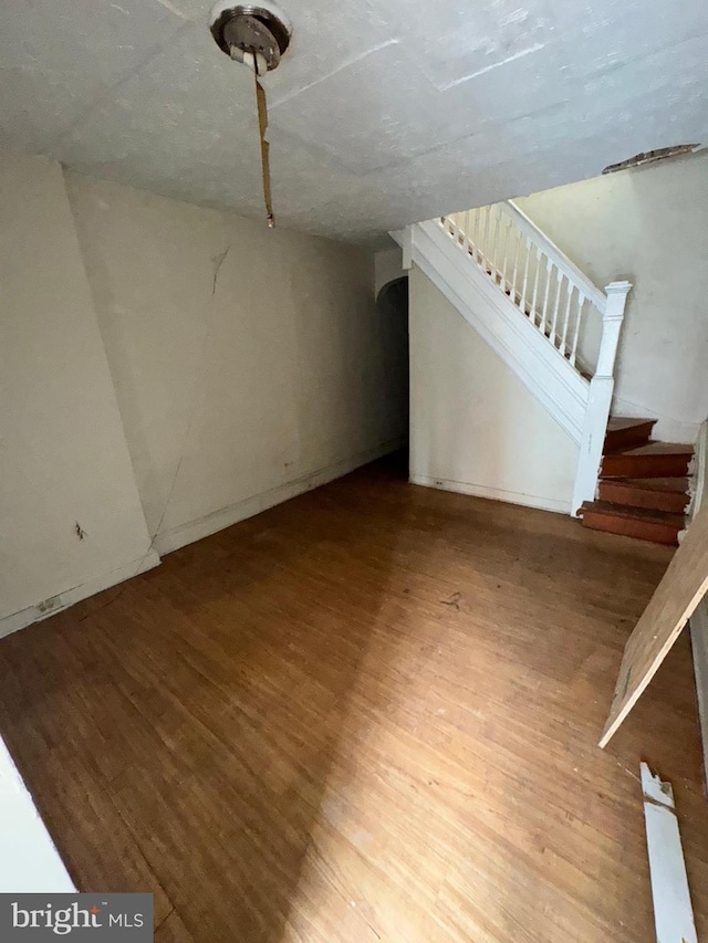 328 S Payson St, Baltimore, MD 21223 - interior space featuring wood finished floors and stairs