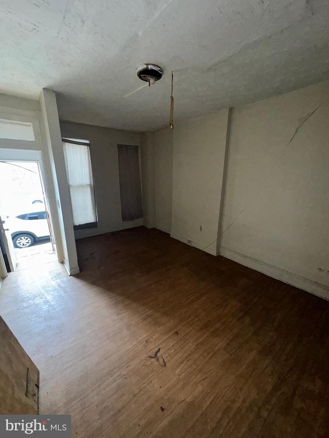 328 S Payson St, Baltimore, MD 21223 - unfurnished room with wood finished floors